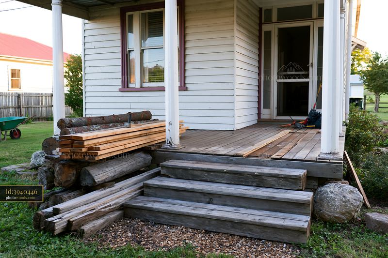 Country house renovation with wooden materials on the porch