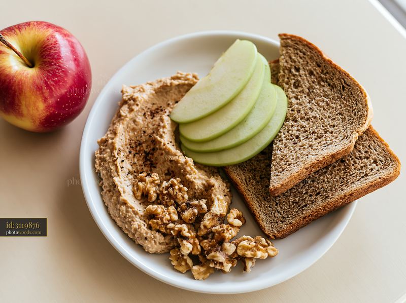 Breakfast plate with hummus and fresh fruit