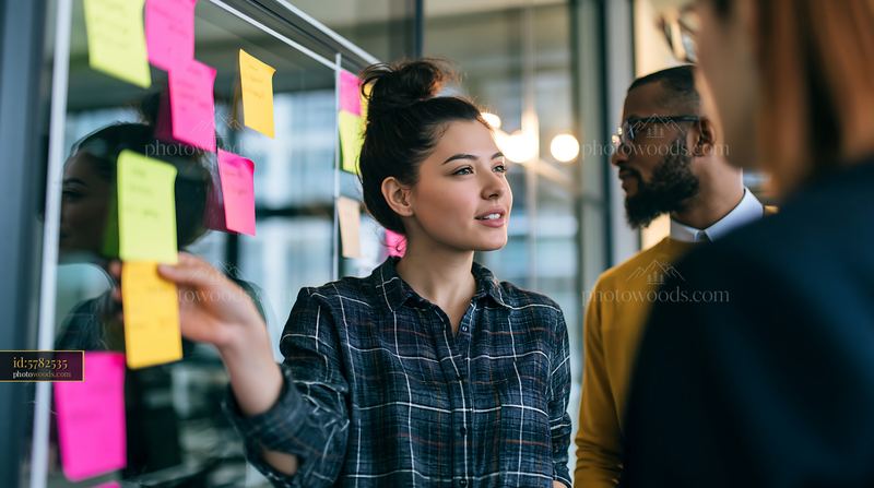 Businesswoman presenting project details with sticky notes