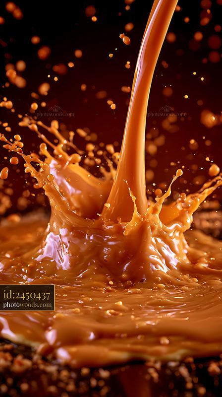 Creamy liquid splashes against a dark background