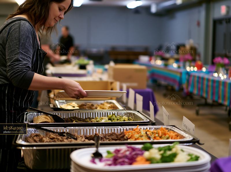 Catering buffet setup with a variety of food options in a hall