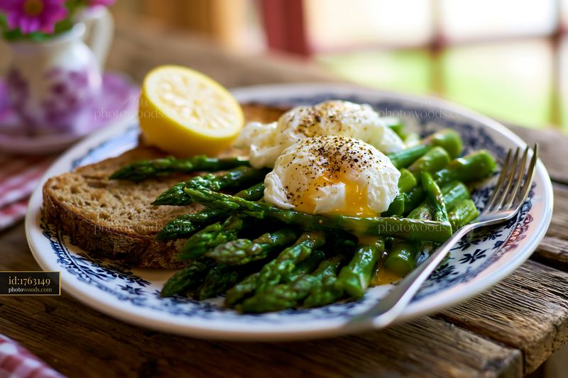 Spring breakfast plate with poached eggs and asparagus on toast
