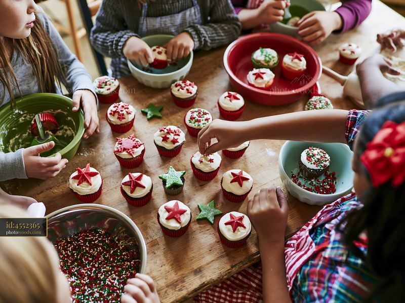 Children decorating Christmas cupcakes at a festive table