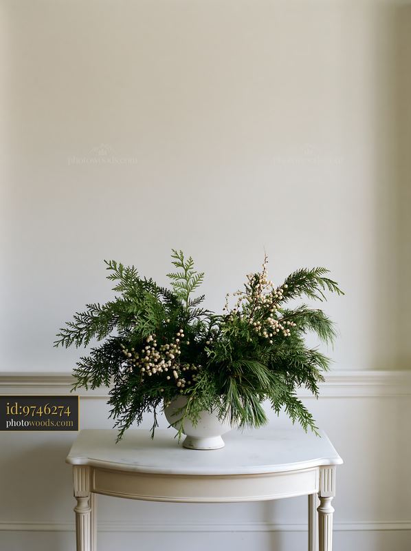 Christmas greenery centerpiece with abundant empty copy space