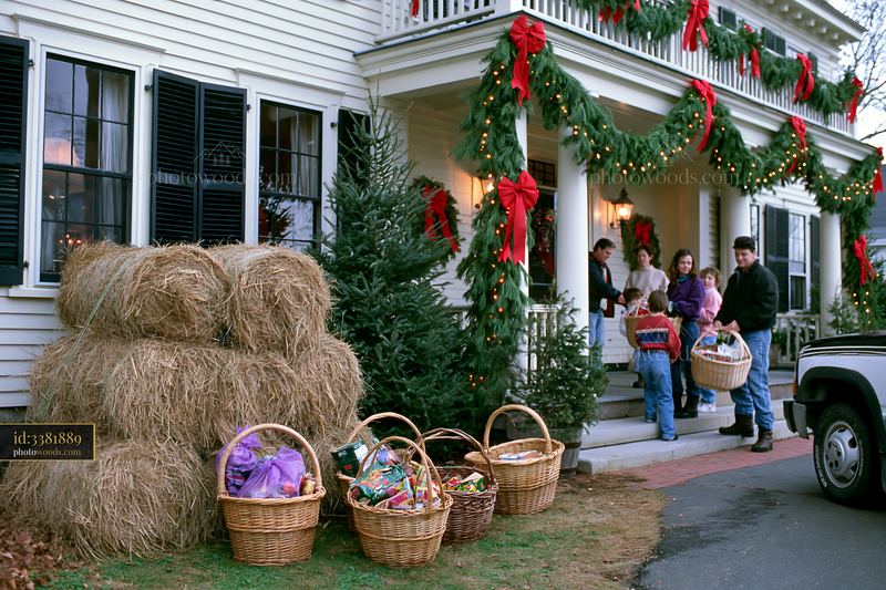 Festive gathering at country house with pine garlands and gifts