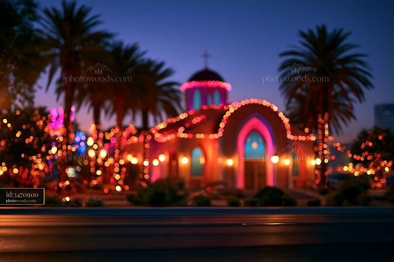 Church illuminated with colorful lights at dusk