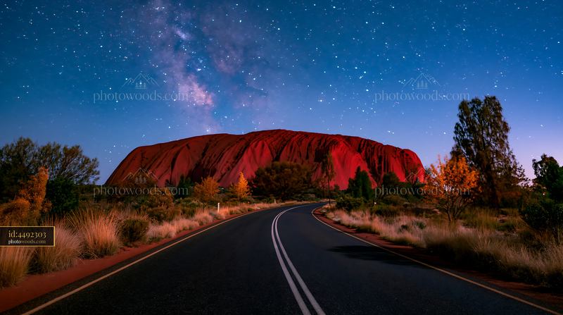 Uluru under a starry night sky creates a breathtaking scene