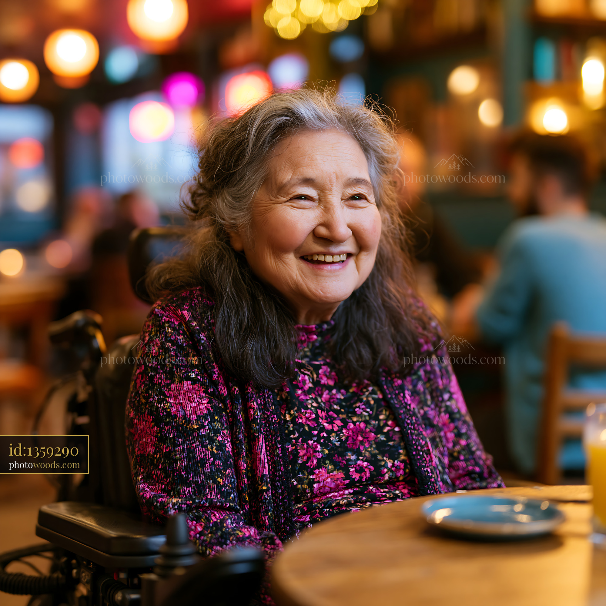 Laughing Grandmother in a Modern Restaurant With Bright Lights