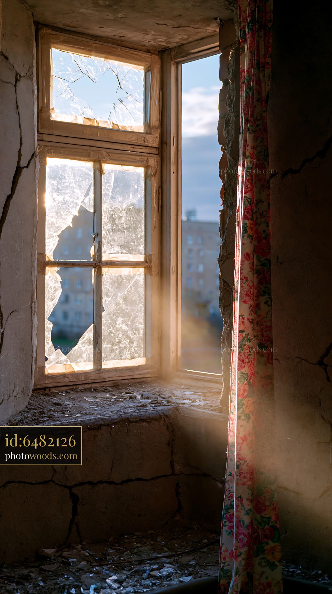 Cracked Window Frame With Sunlight Streaming Into an Interior