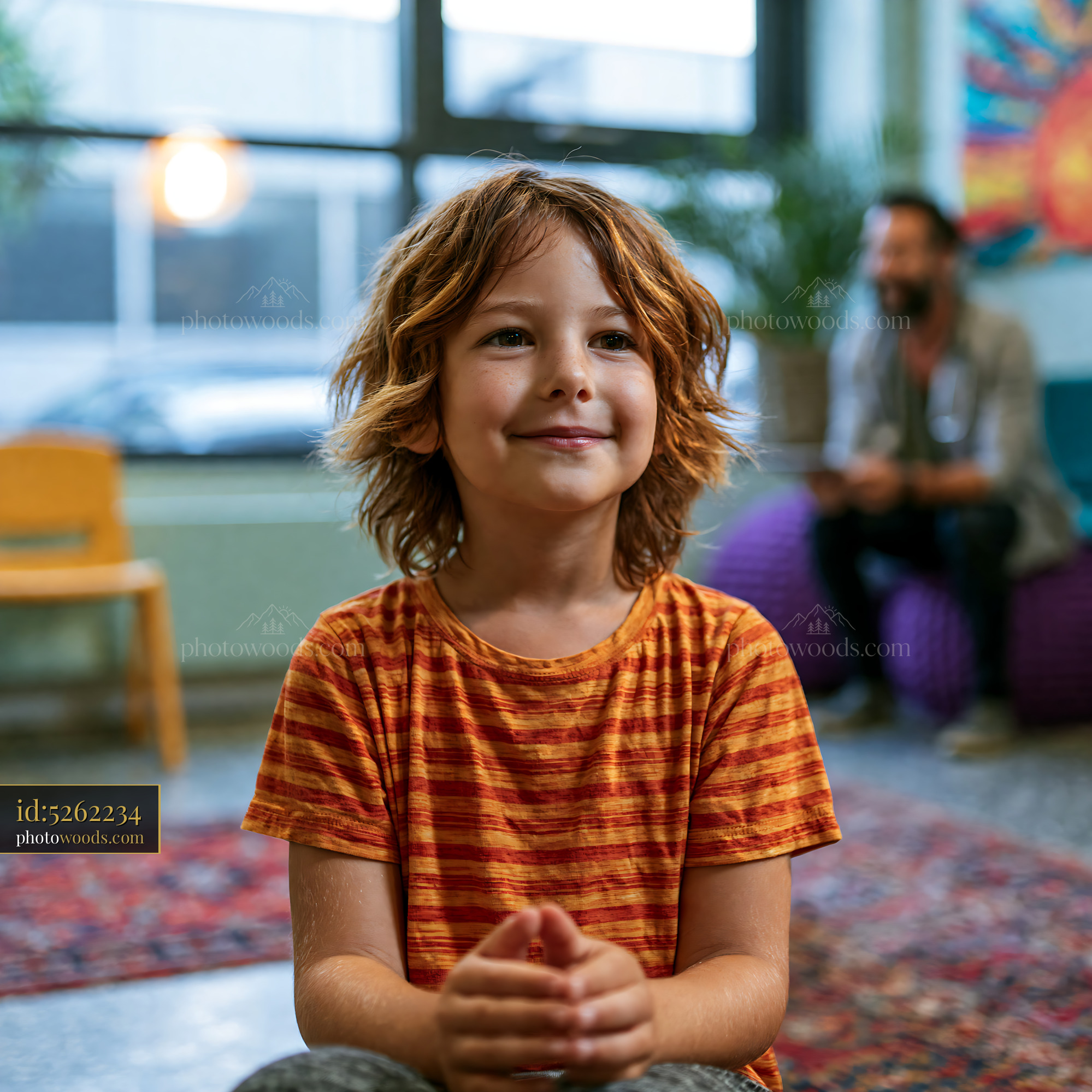 Child in Therapy Session Indoors Experiencing Interaction