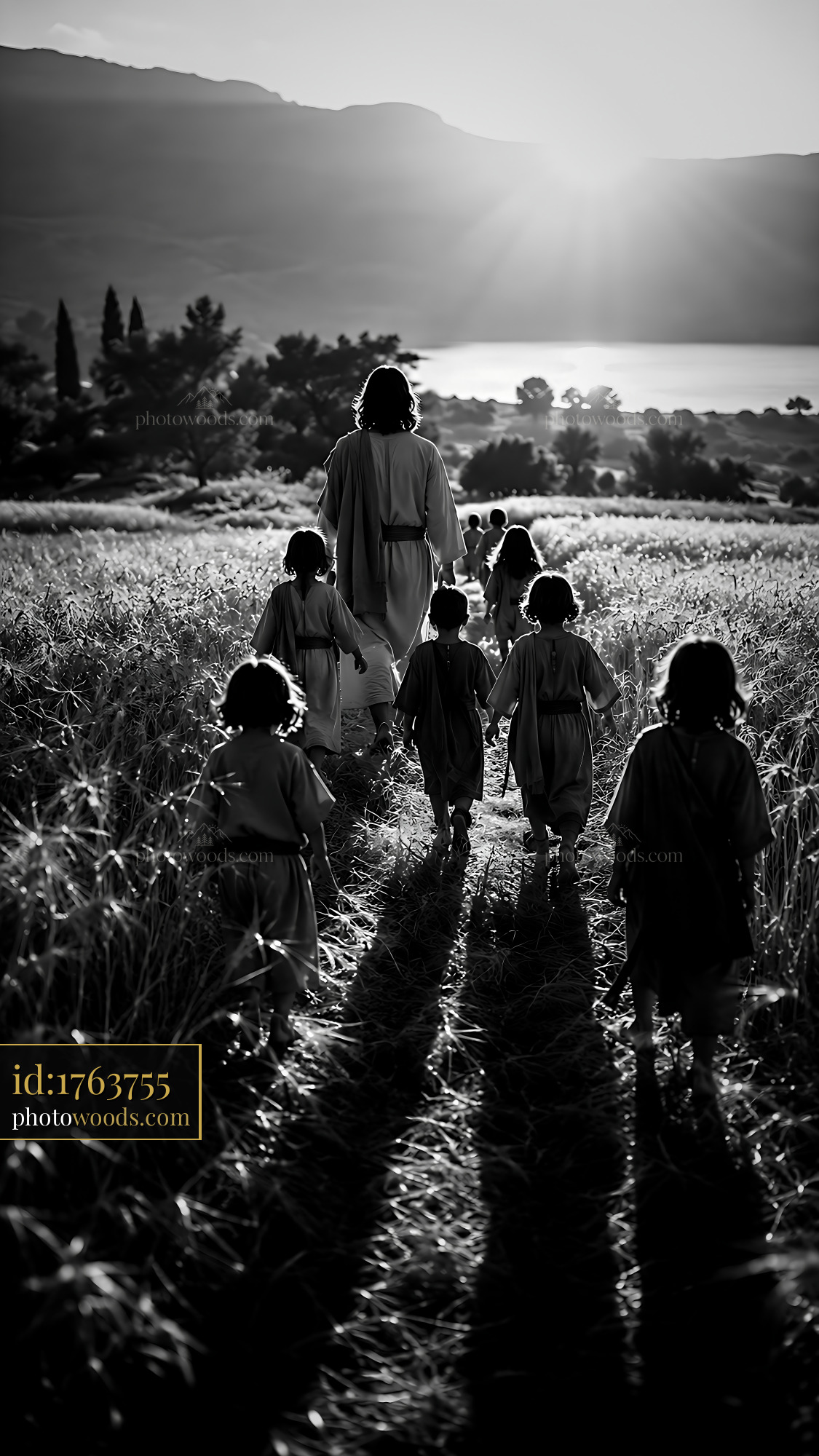 People Walking in a Field With a Person Leading Children Behind