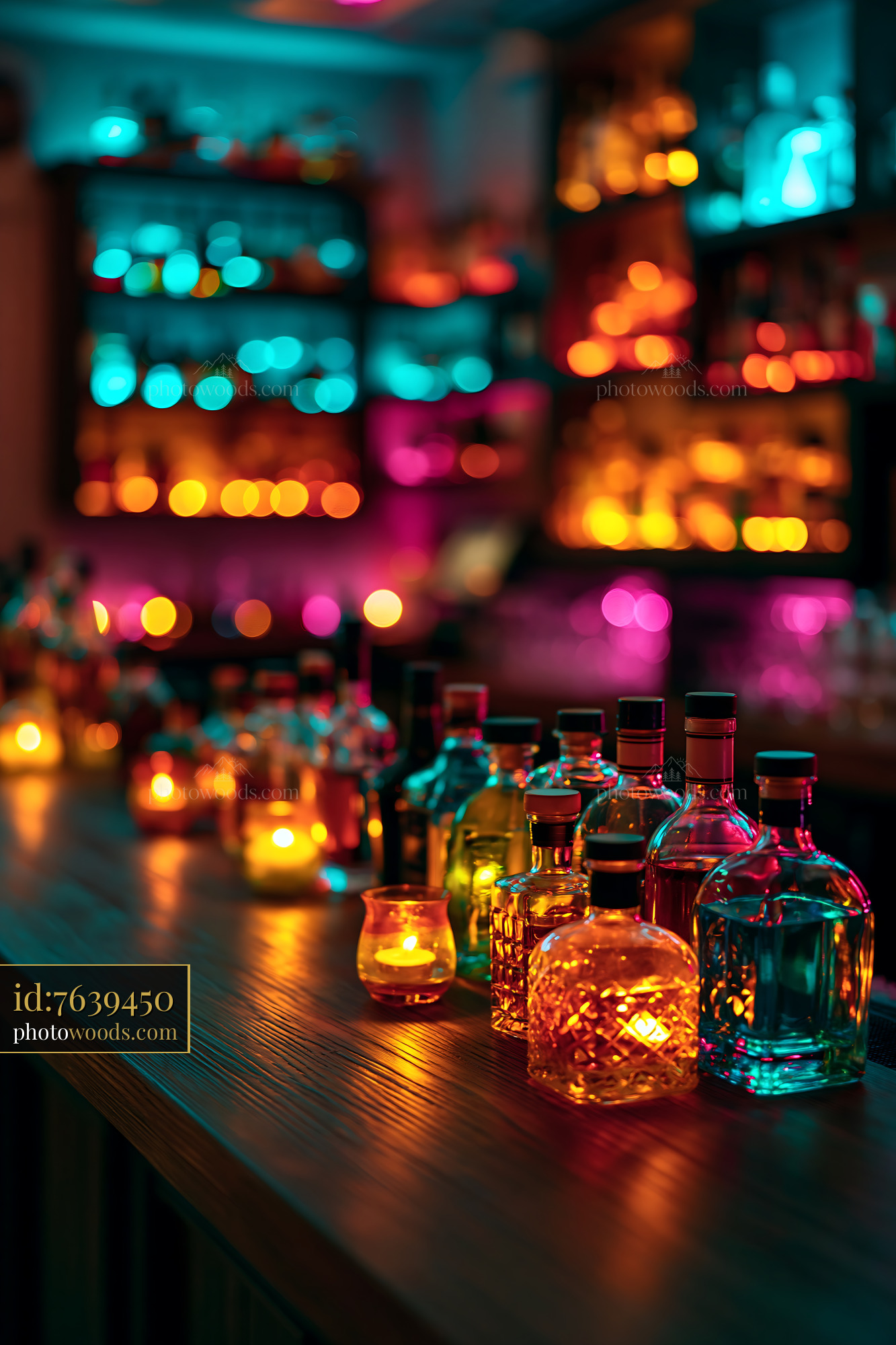 Bottles of Liquor Arranged on a Bar Table With Colorful Lights