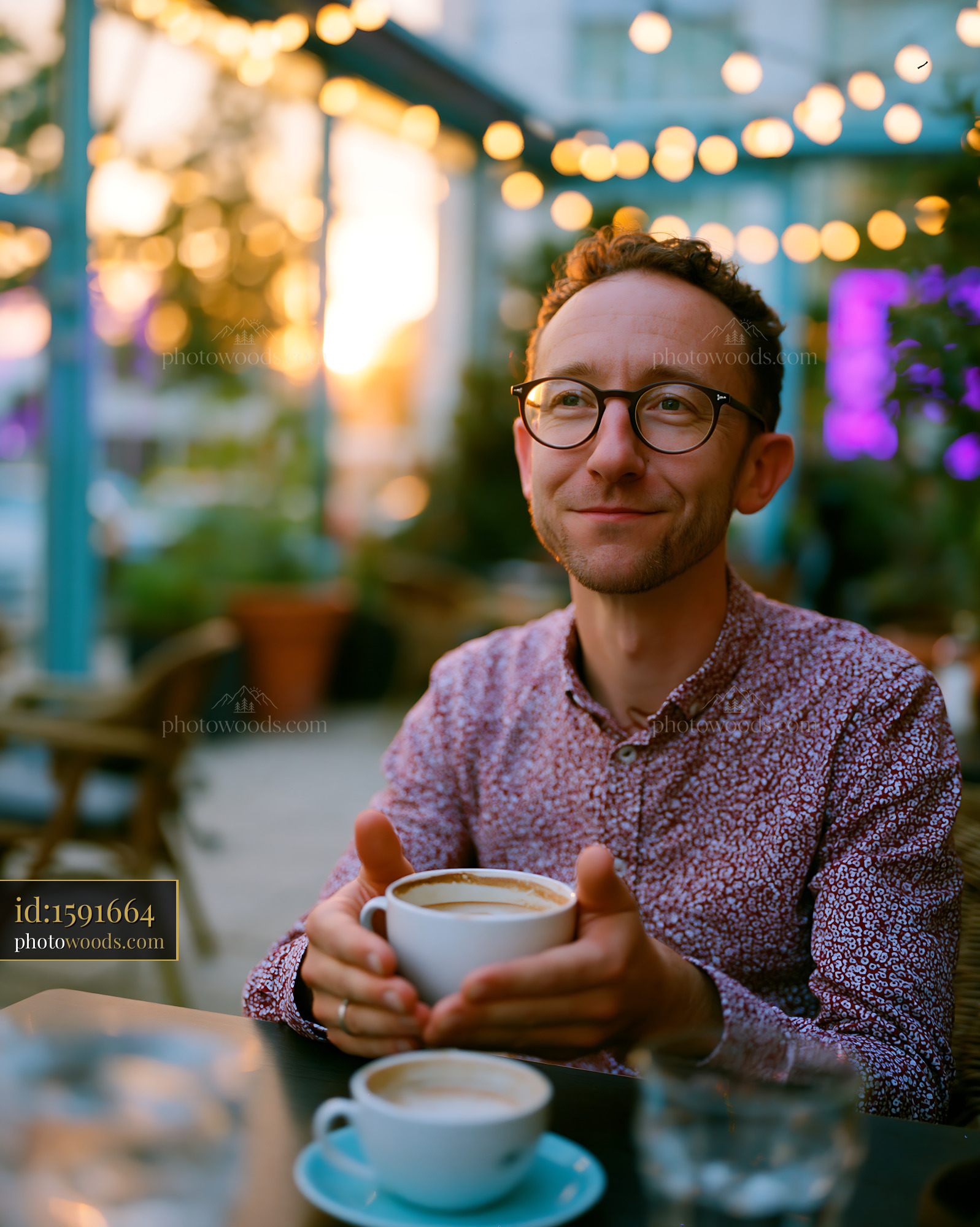 Teacher Enjoying Coffee at Outdoor Cafe During Sunset