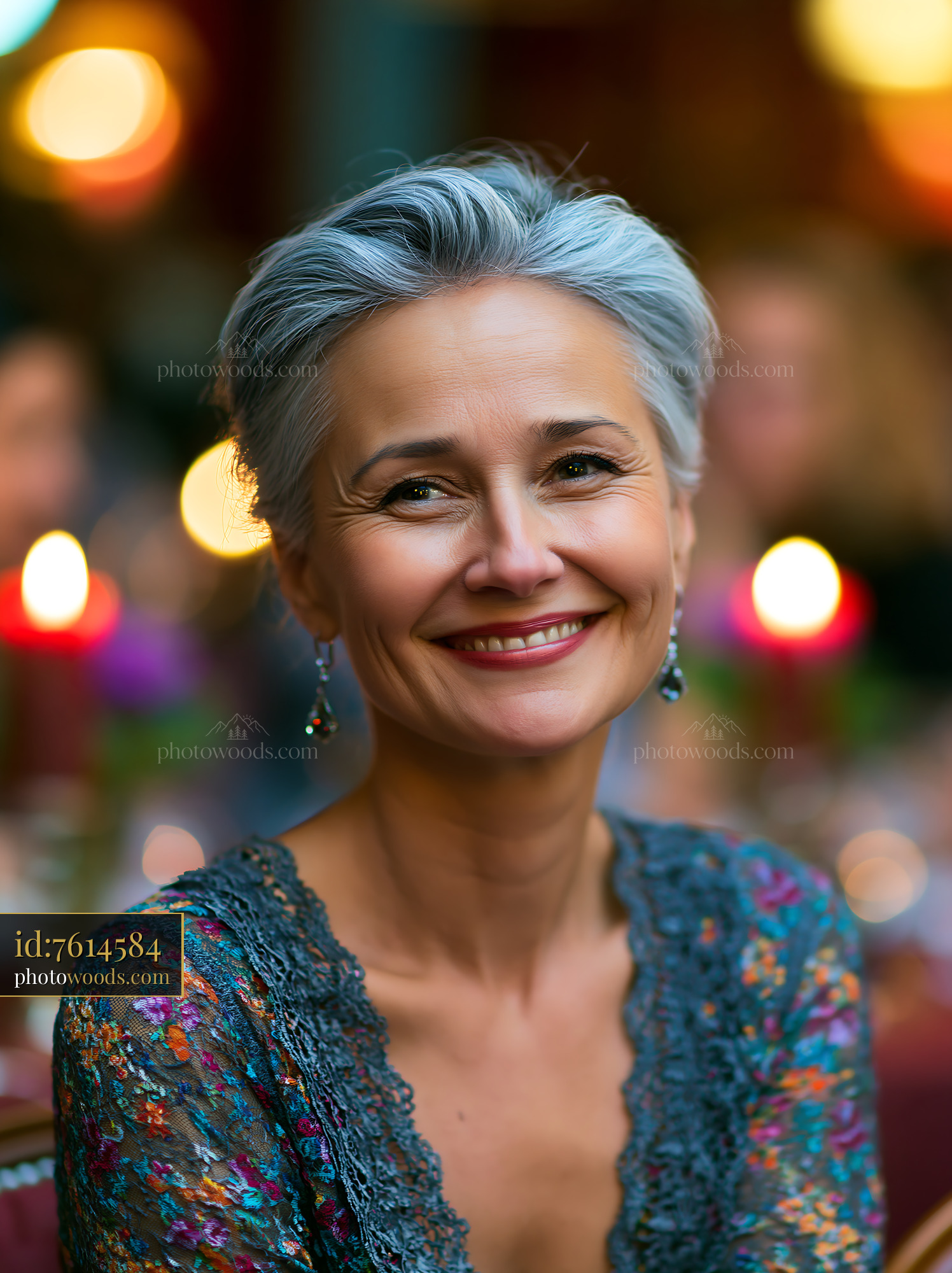 Woman Smiling at a Banquet With Candles and Colorful Lights