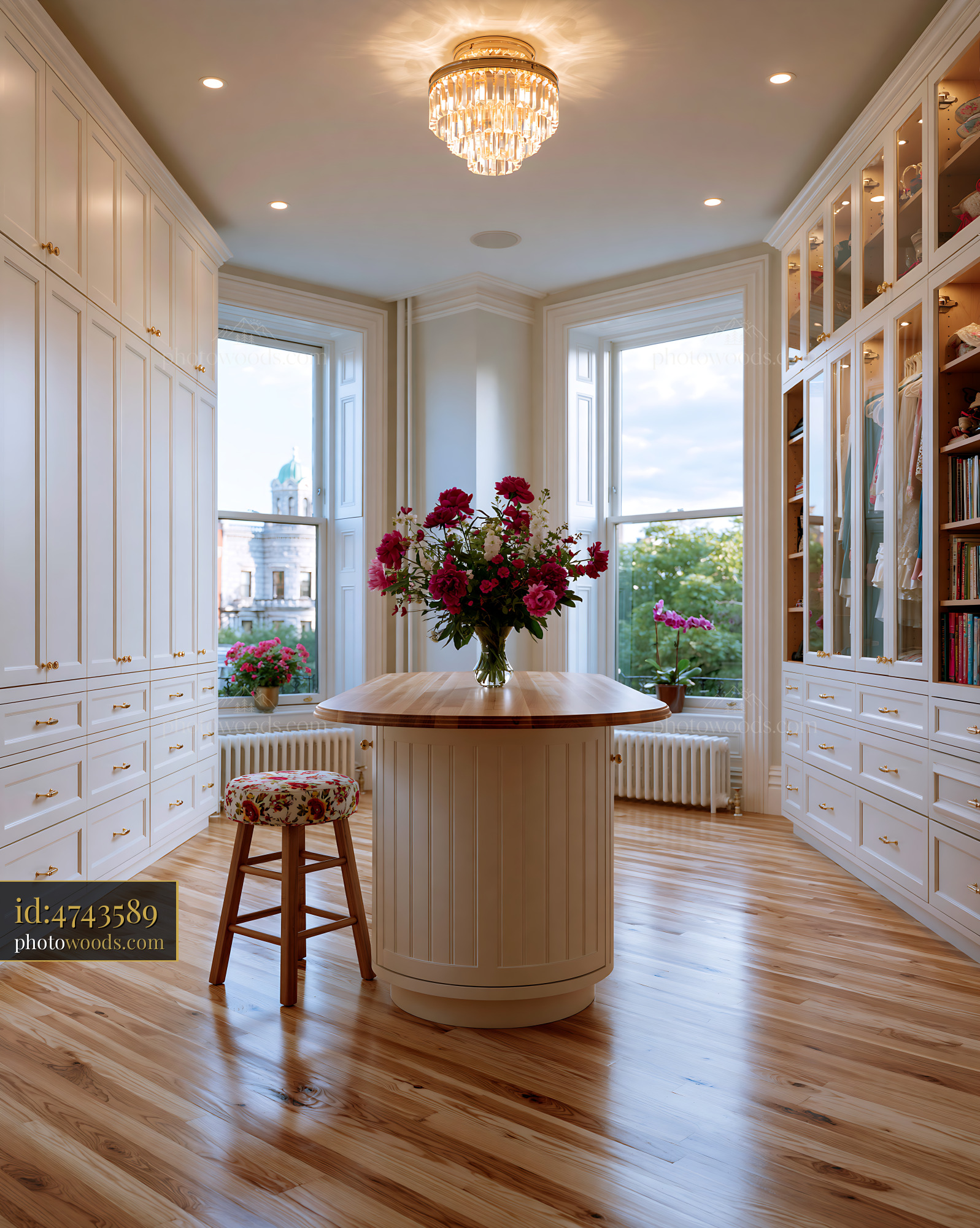 Dressing Room With Island and Flower Arrangement in Modern Home