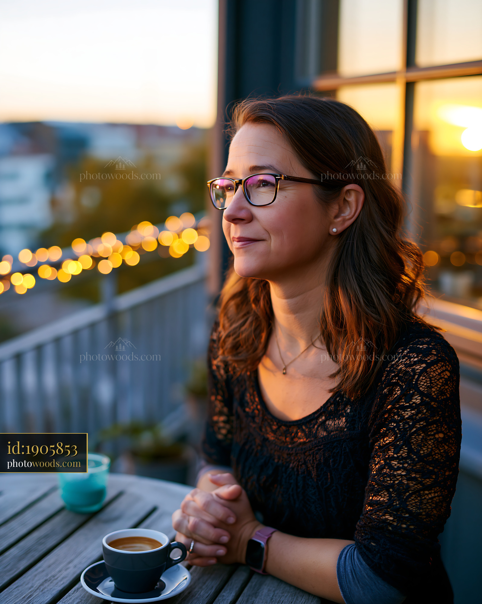 Deaf Teacher Enjoying Coffee During Sunset on a Balcony