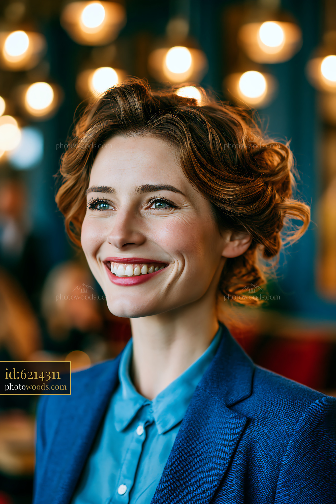 Woman Smiling in a Stylish Cafe With Warm Lighting and People