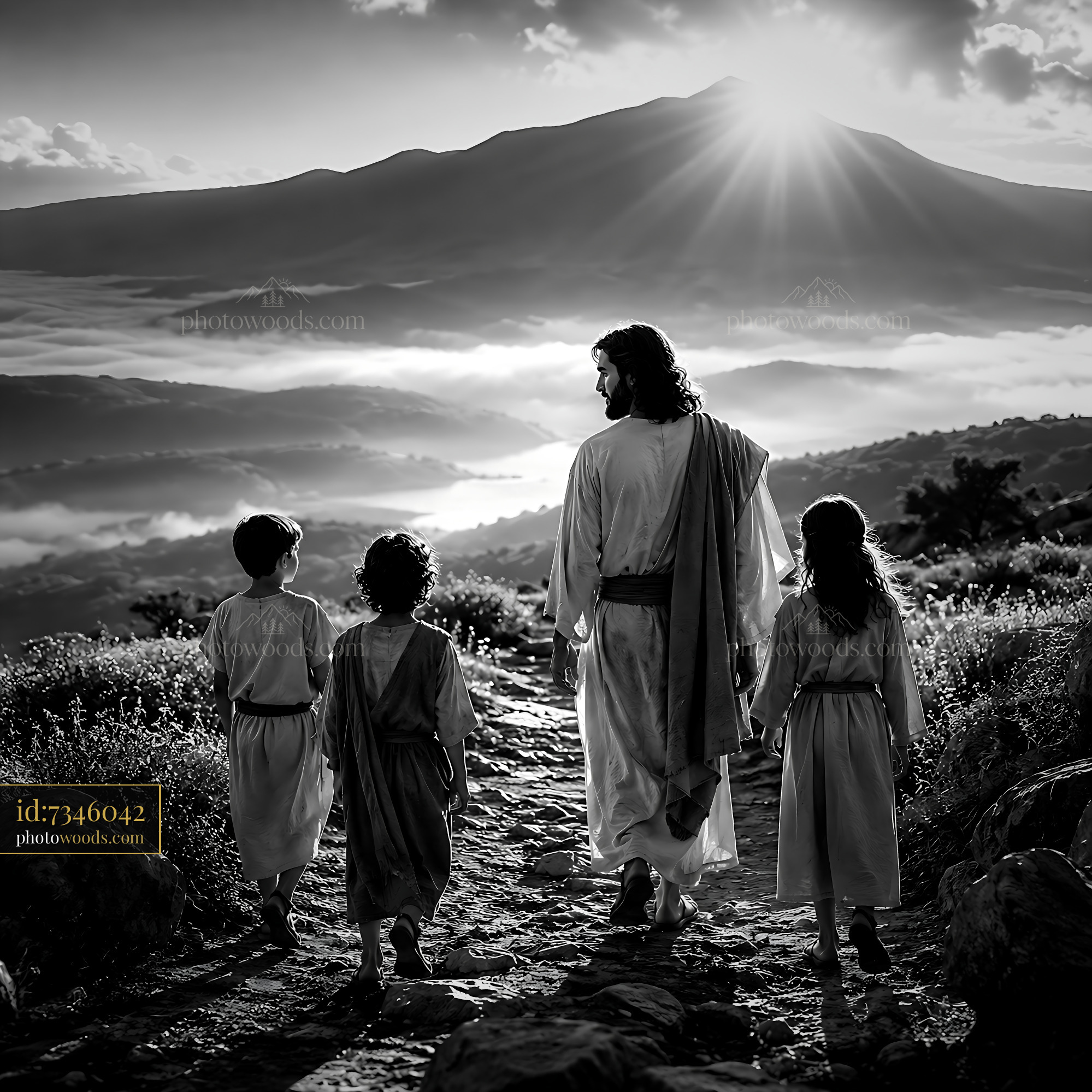 Man Walks on Path With Three Children Towards Mountain Sunrise