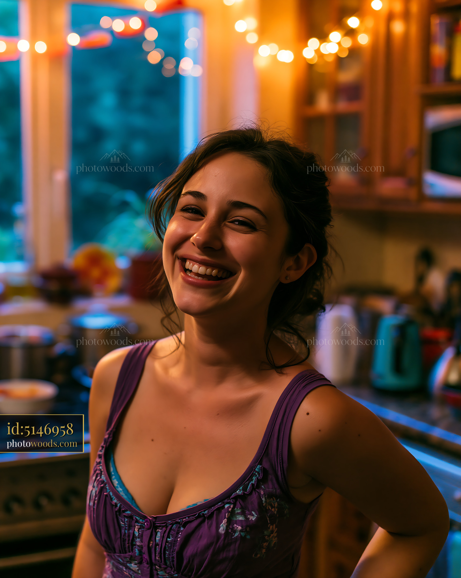 Woman Laughing in a Kitchen With Warm Light and Evening Ambiance