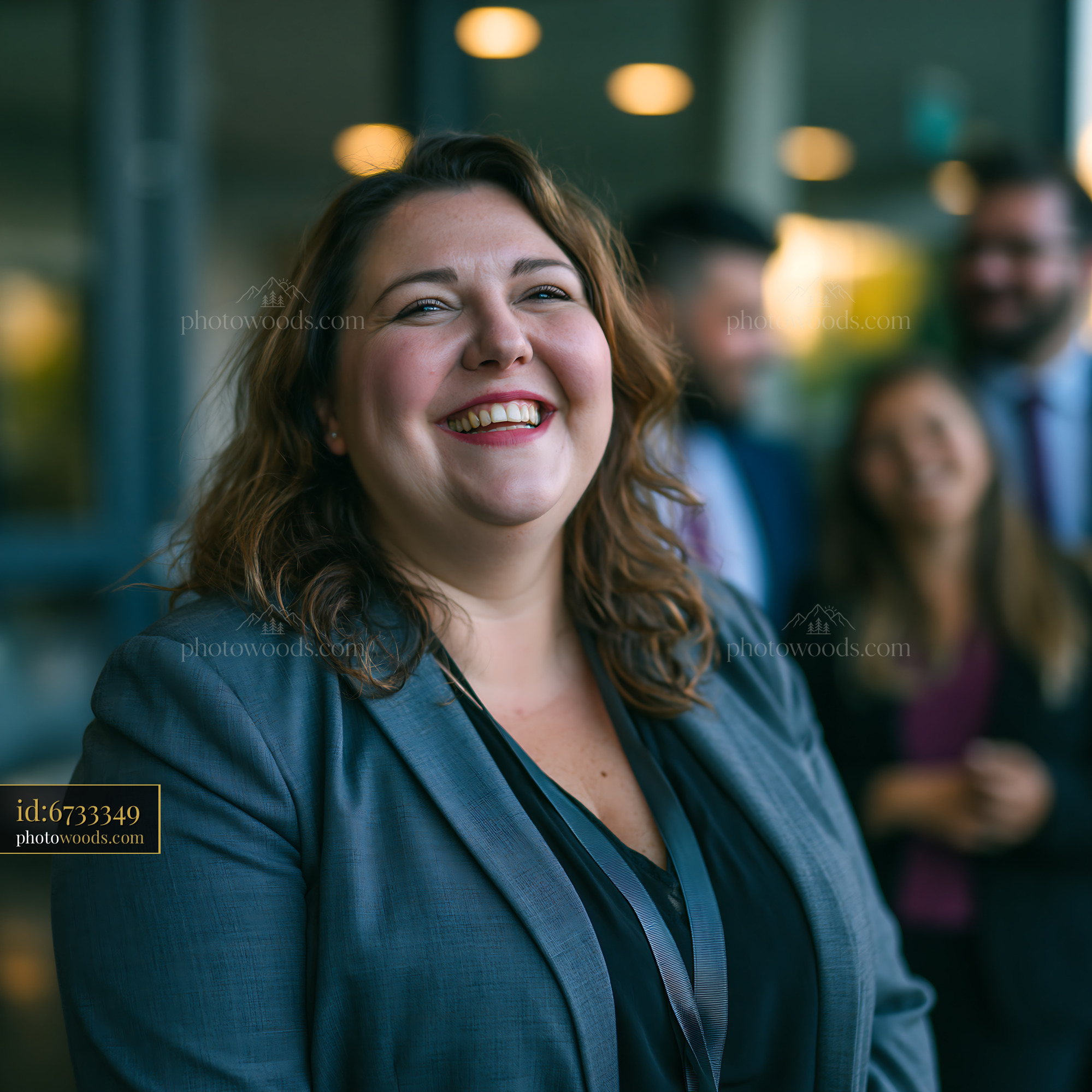 Plus Size Businesswoman Smiling During a Corporate Event