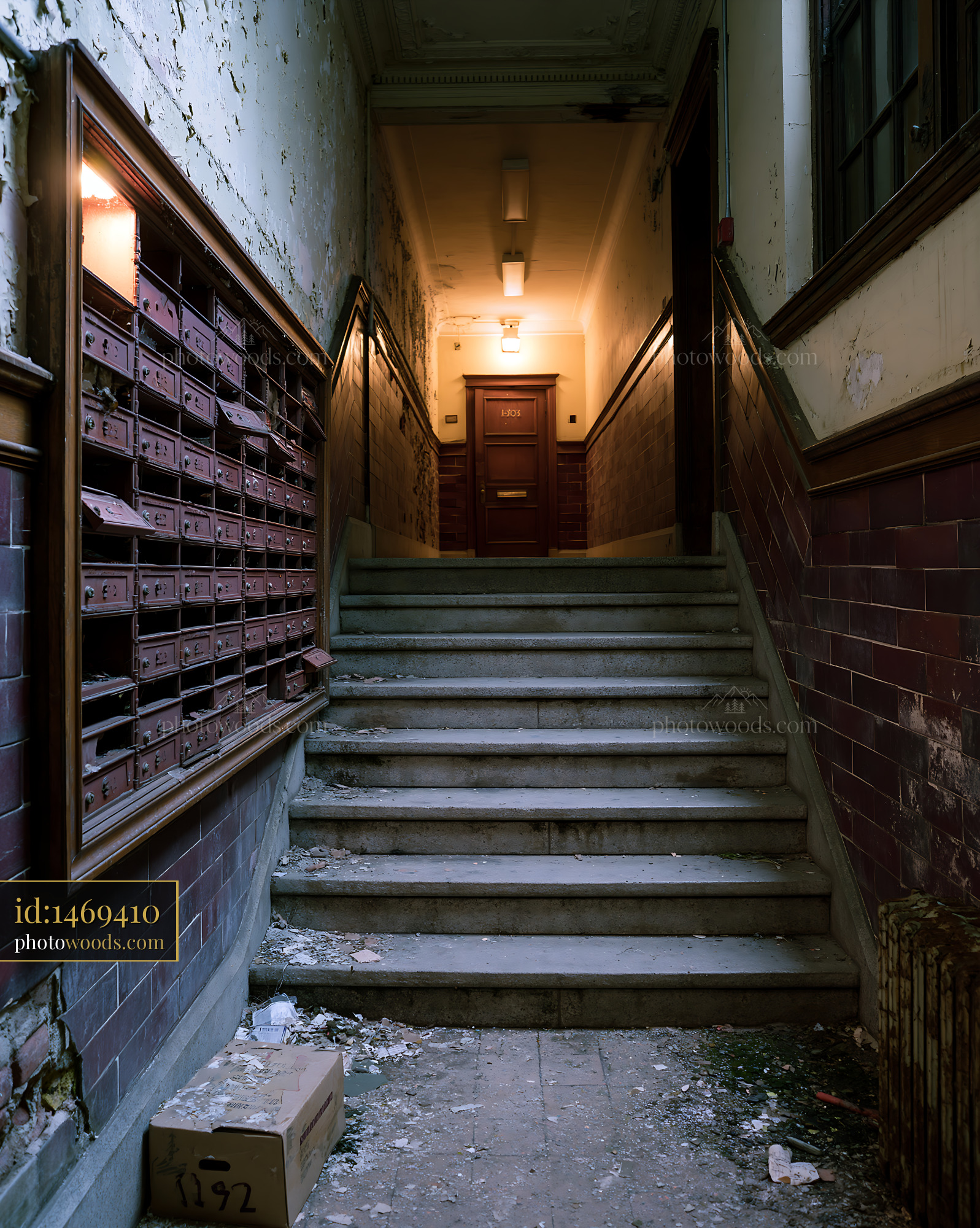Rundown Building Entrance With Broken Mailboxes and Dim Lighting