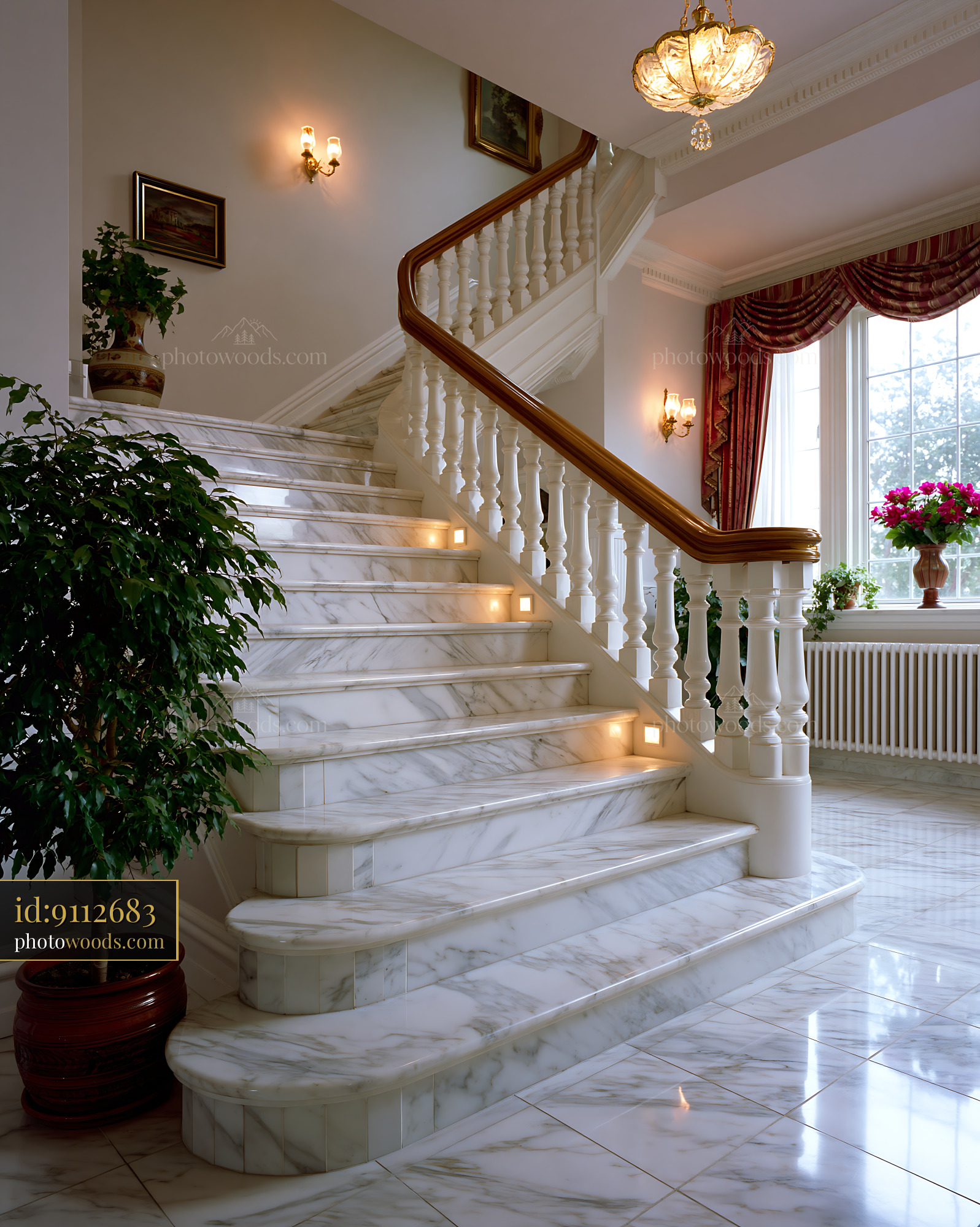 Marble Staircase in an Elegant Entrance Hall With Natural Light