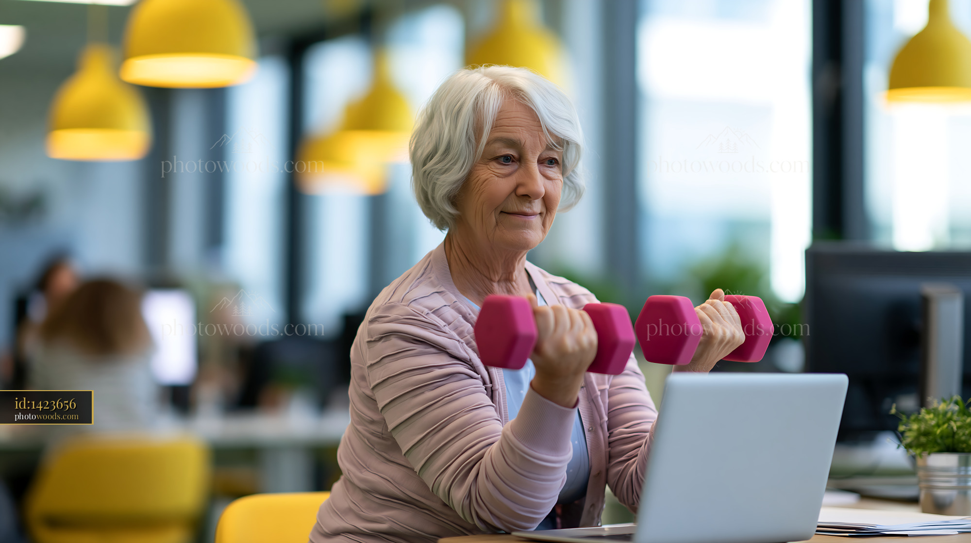 Senior Woman Lifting Weights in Modern Workspace