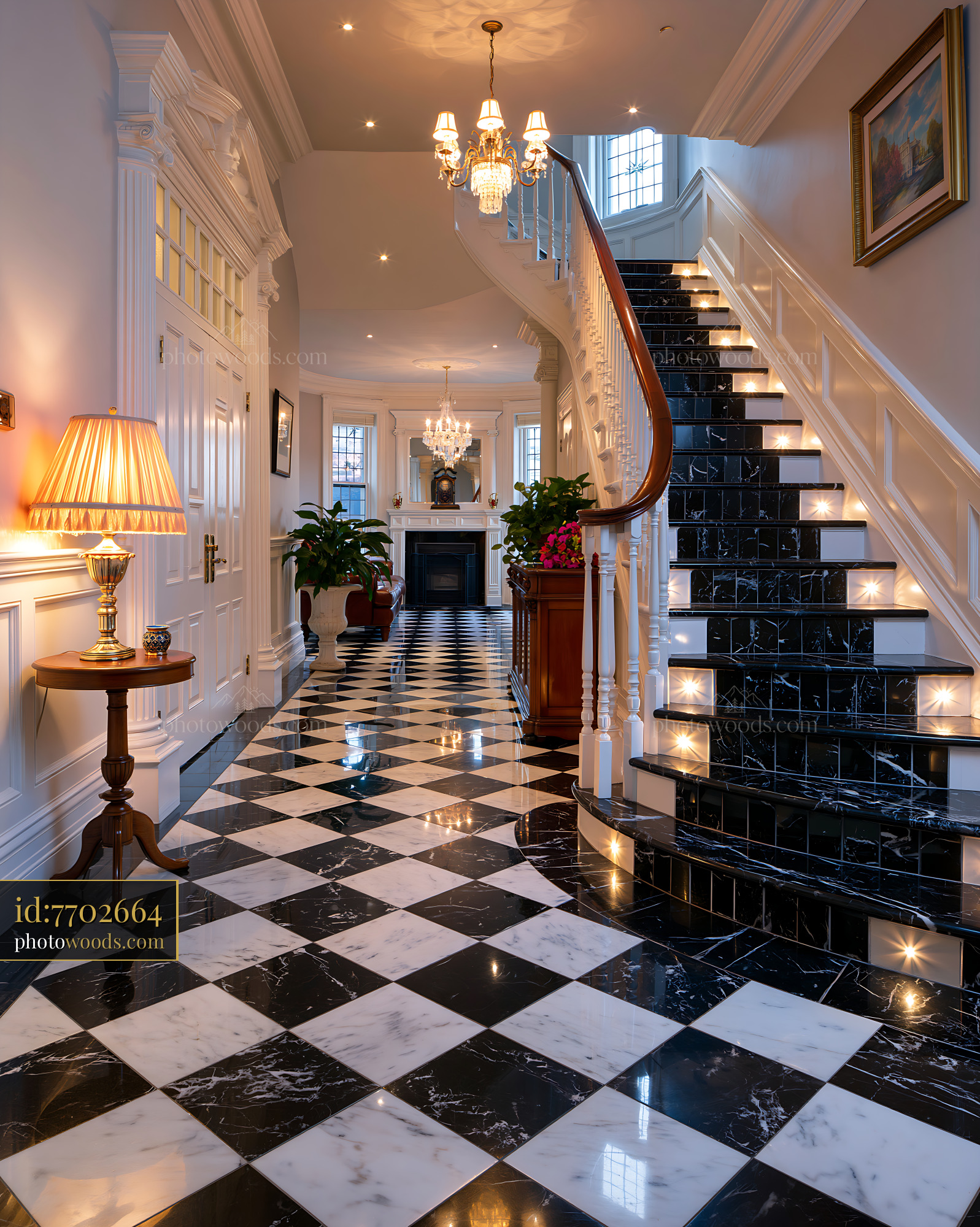 Marble Entrance Hall With Sweeping Staircase and Elegant Decor