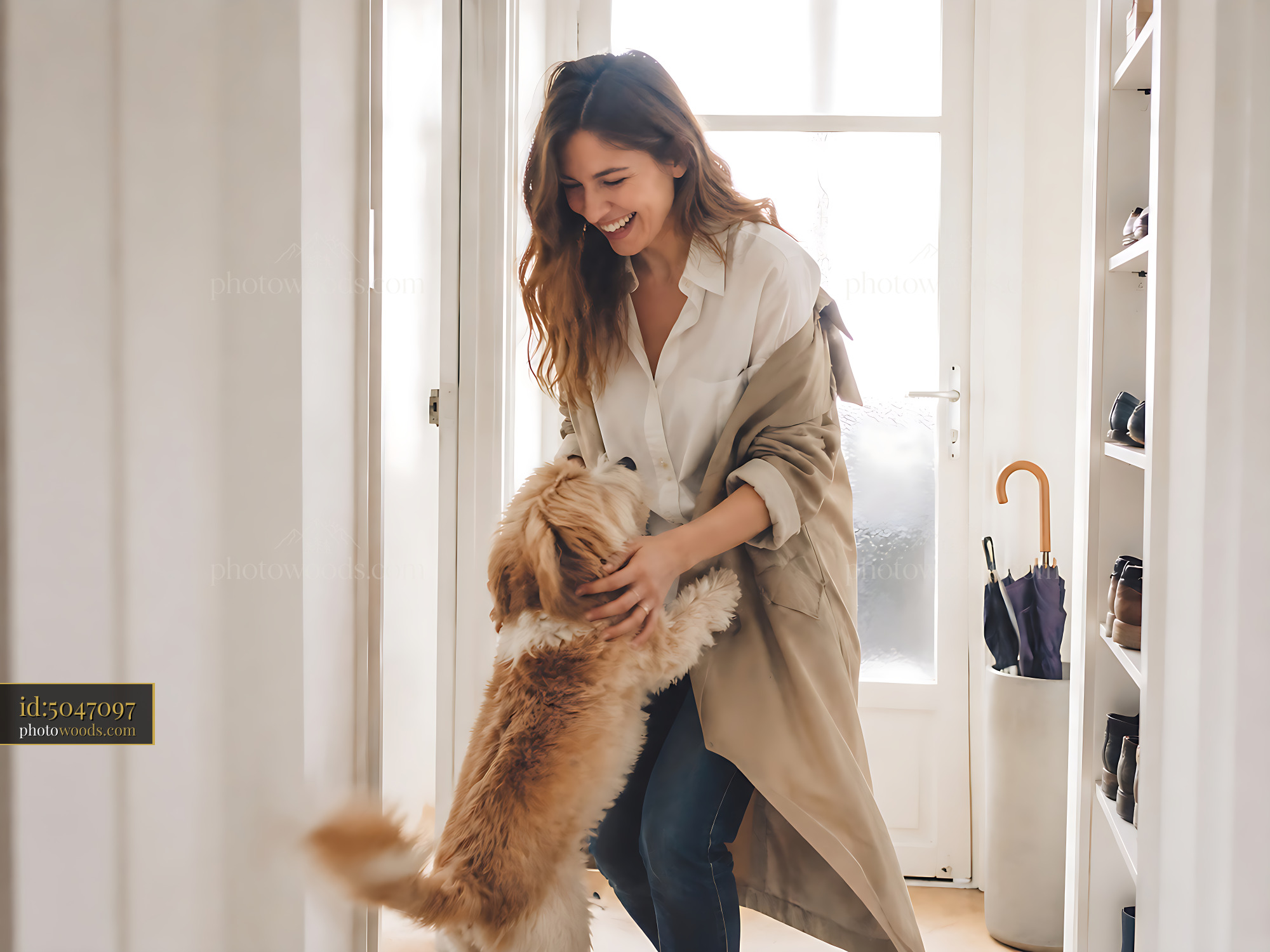 Woman Plays With Dog in a Hallway of a Bright Home