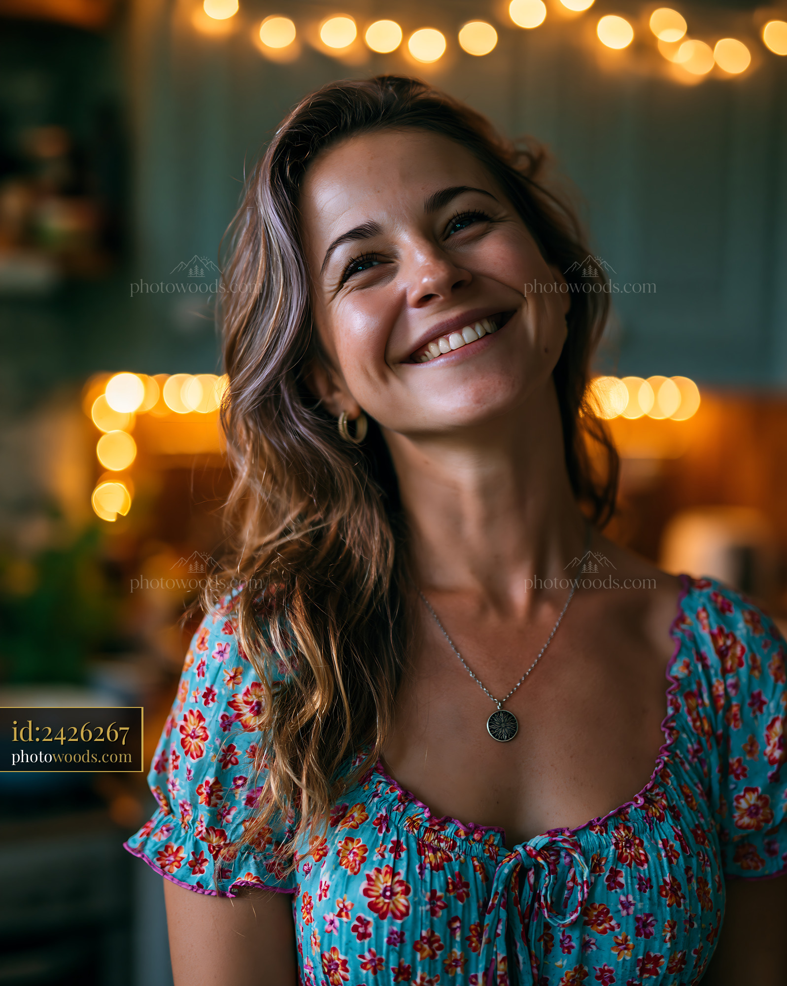 Woman Smiles in a Kitchen With Warm Lights and Colorful Decor