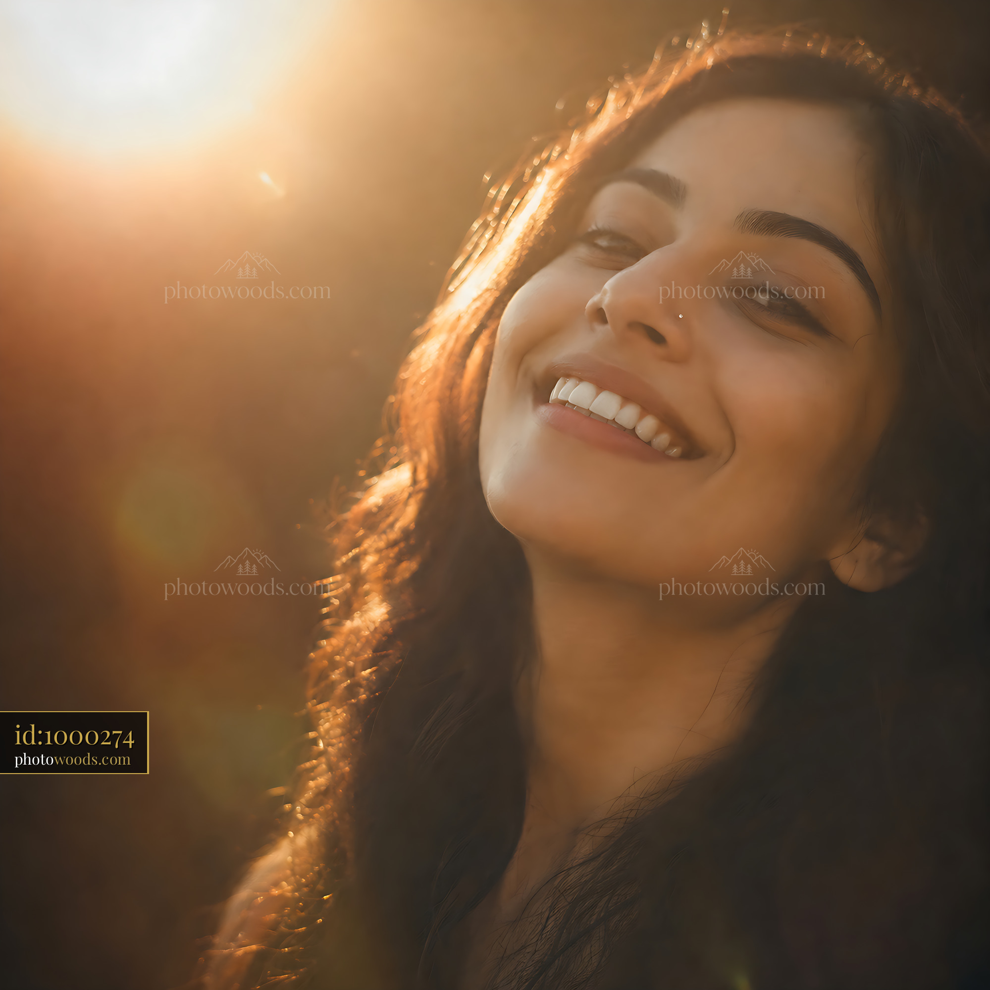 Woman Smiling Under Warm Sunlight With Natural Background