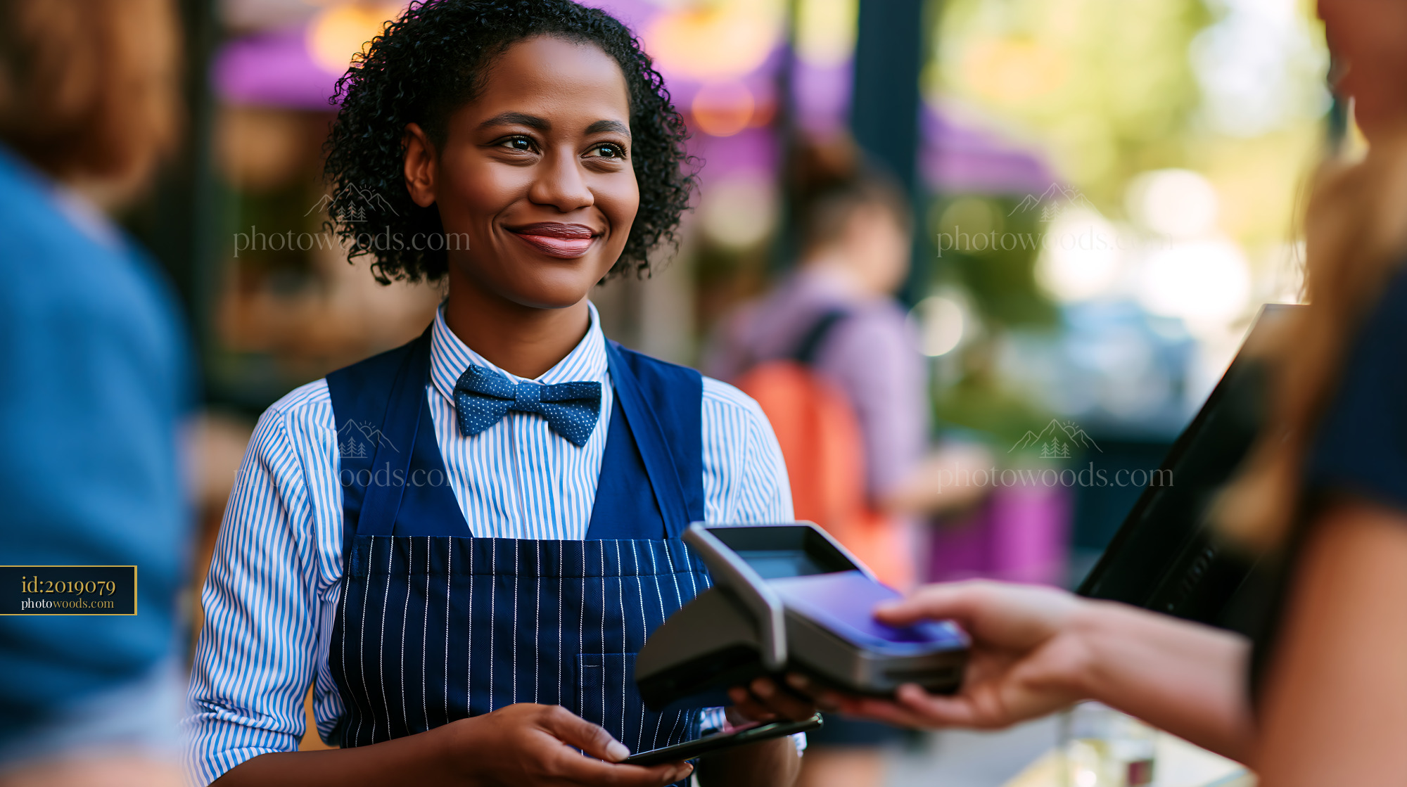 Young Professional Serving Customers at Outdoor Caf?