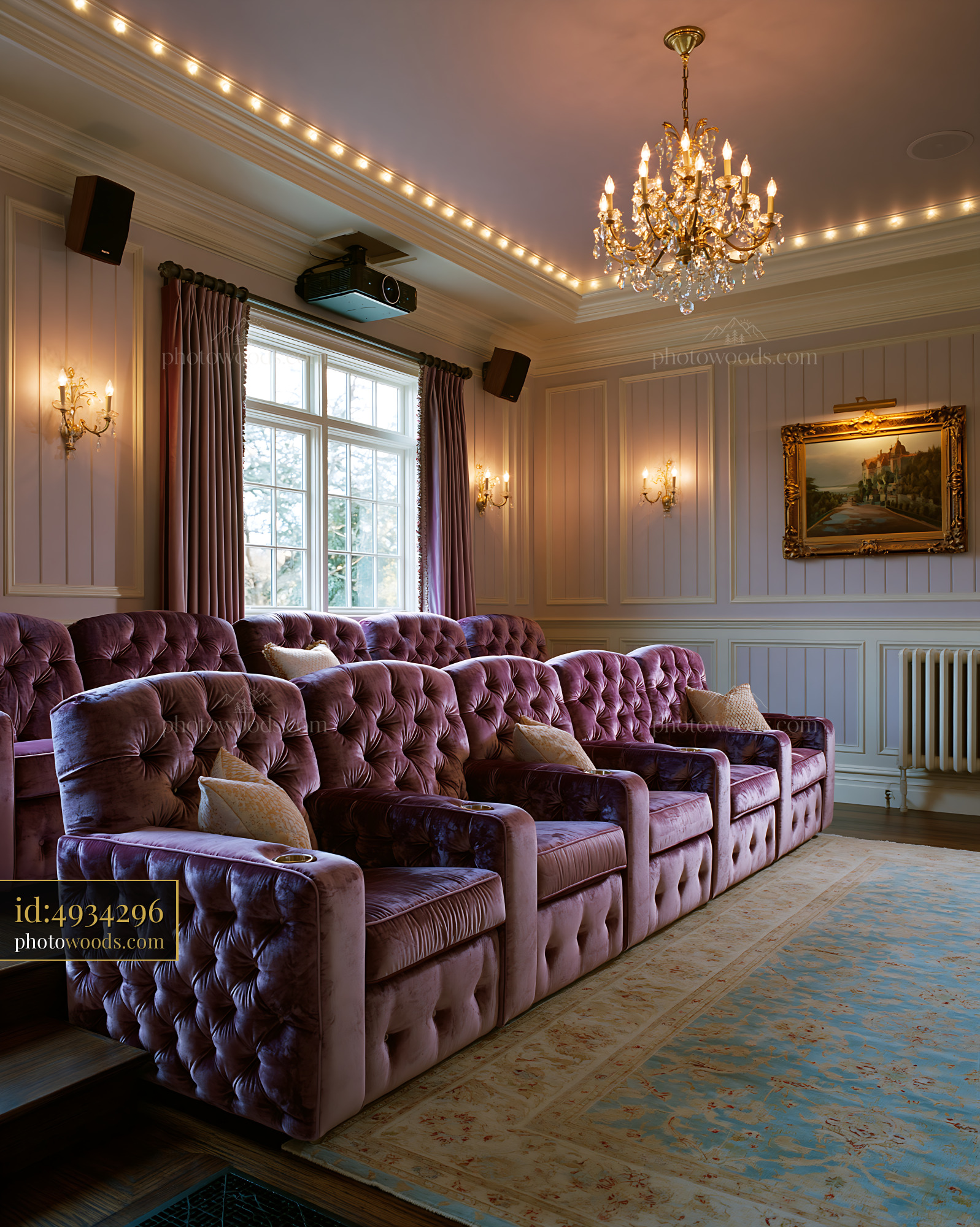 Home Cinema With Velvet Seating and Chandelier in Lakefront Setting