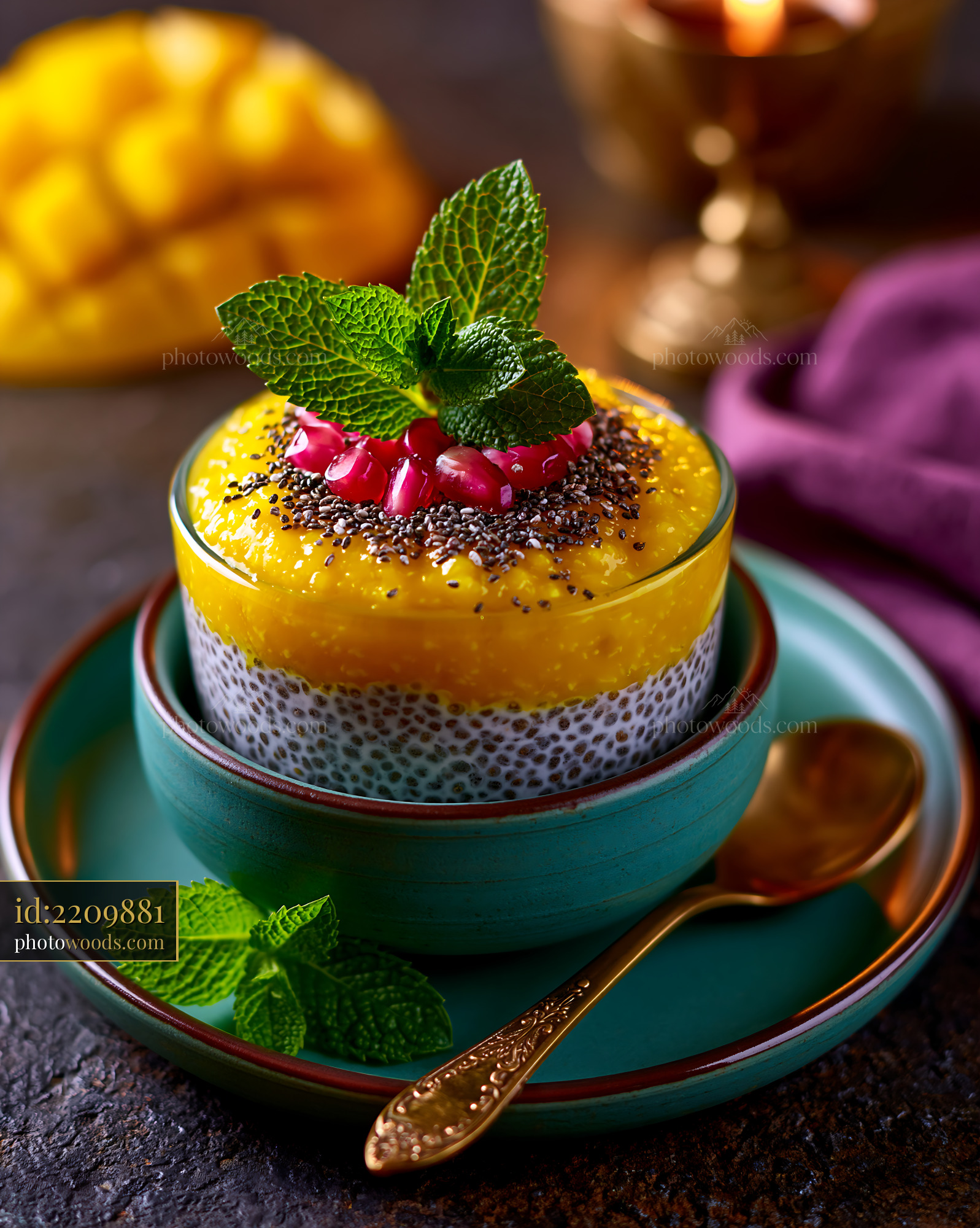 Coconut Chia Pudding With Mango Puree and Mint Garnish