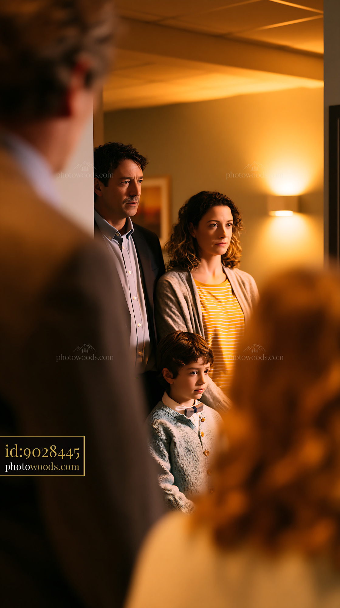 Family Standing Together During Consultation in an Office